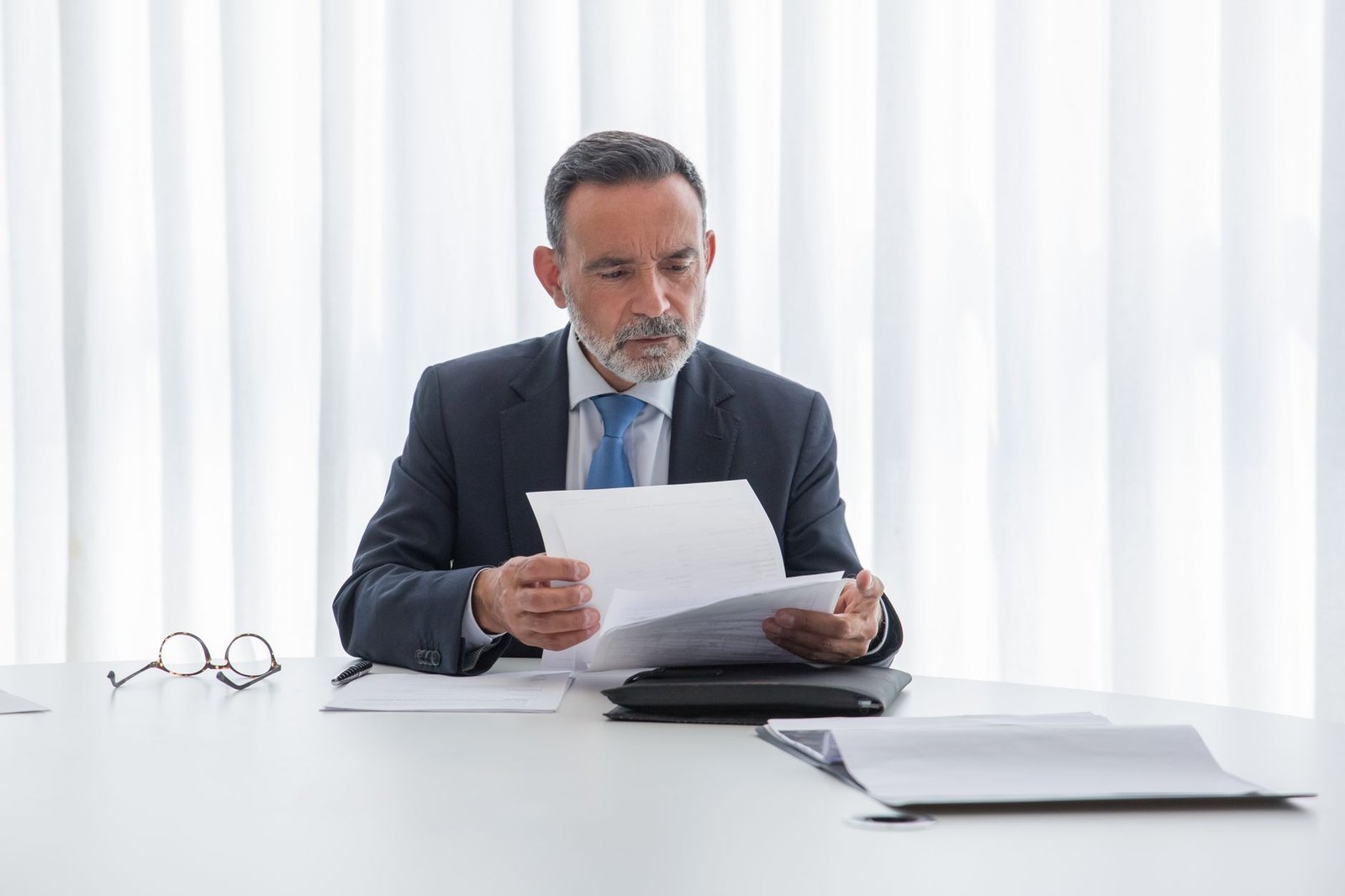 Older veteran checking official rate tables related to VA disability COLA increases