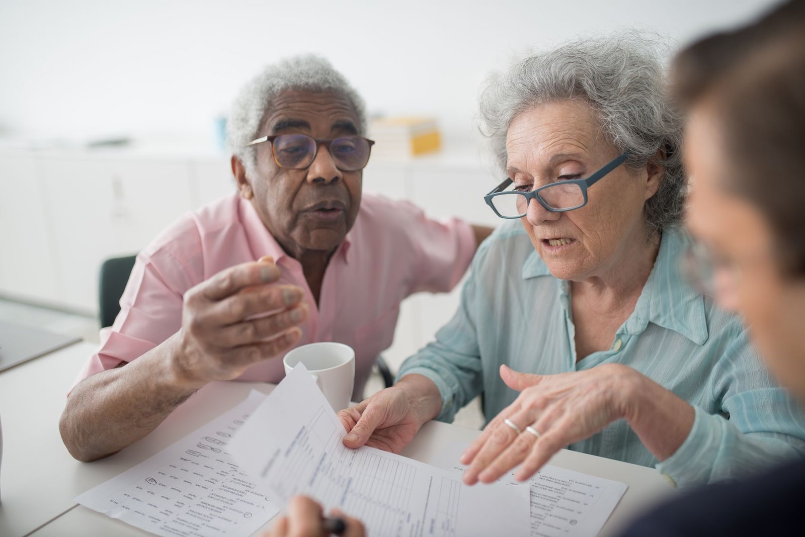 Advisor helping a veteran's family request expedited VA claim processing paperwork