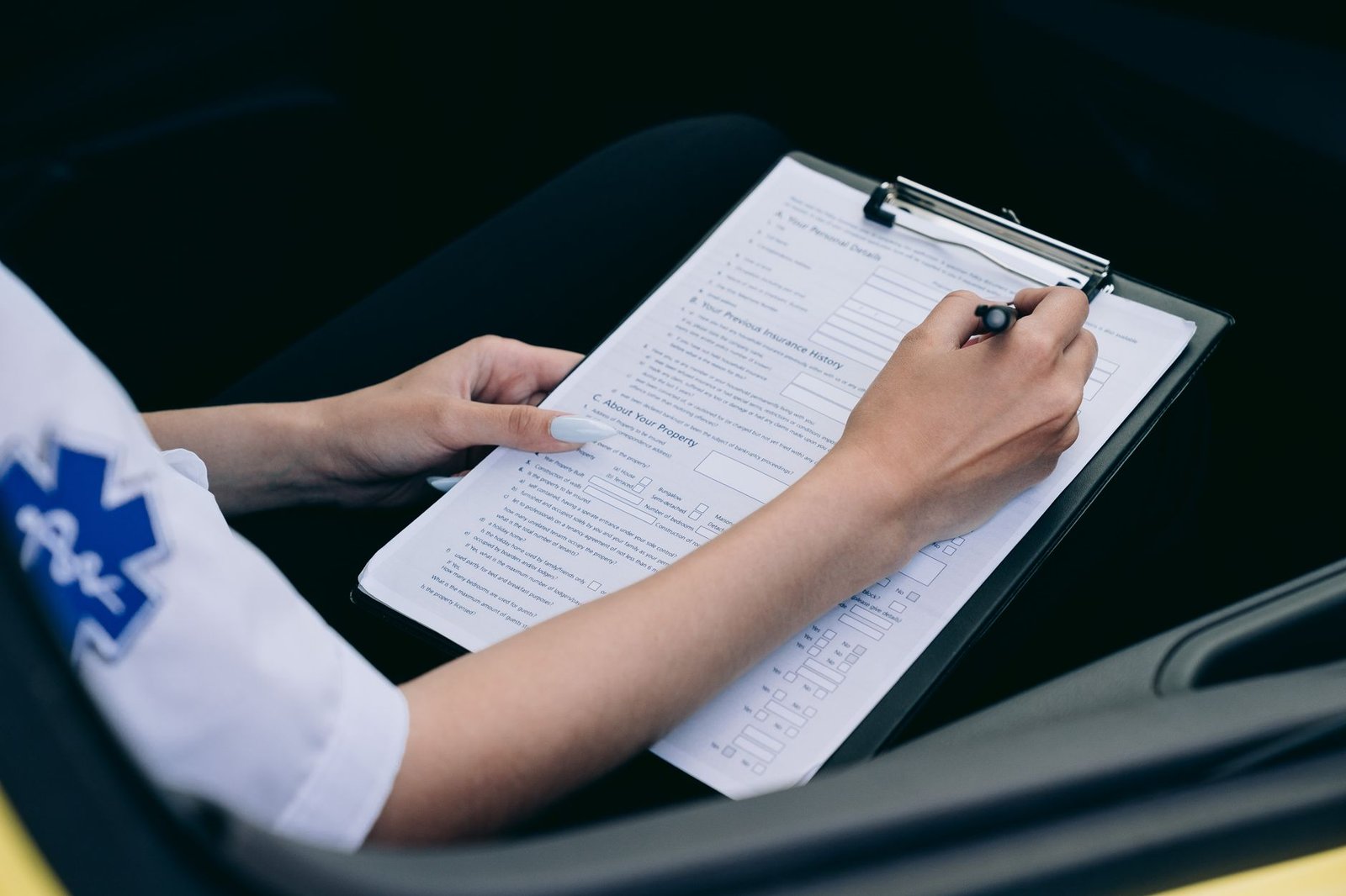 Clinician completing a VA DBQ for respiratory conditions on a clipboard
